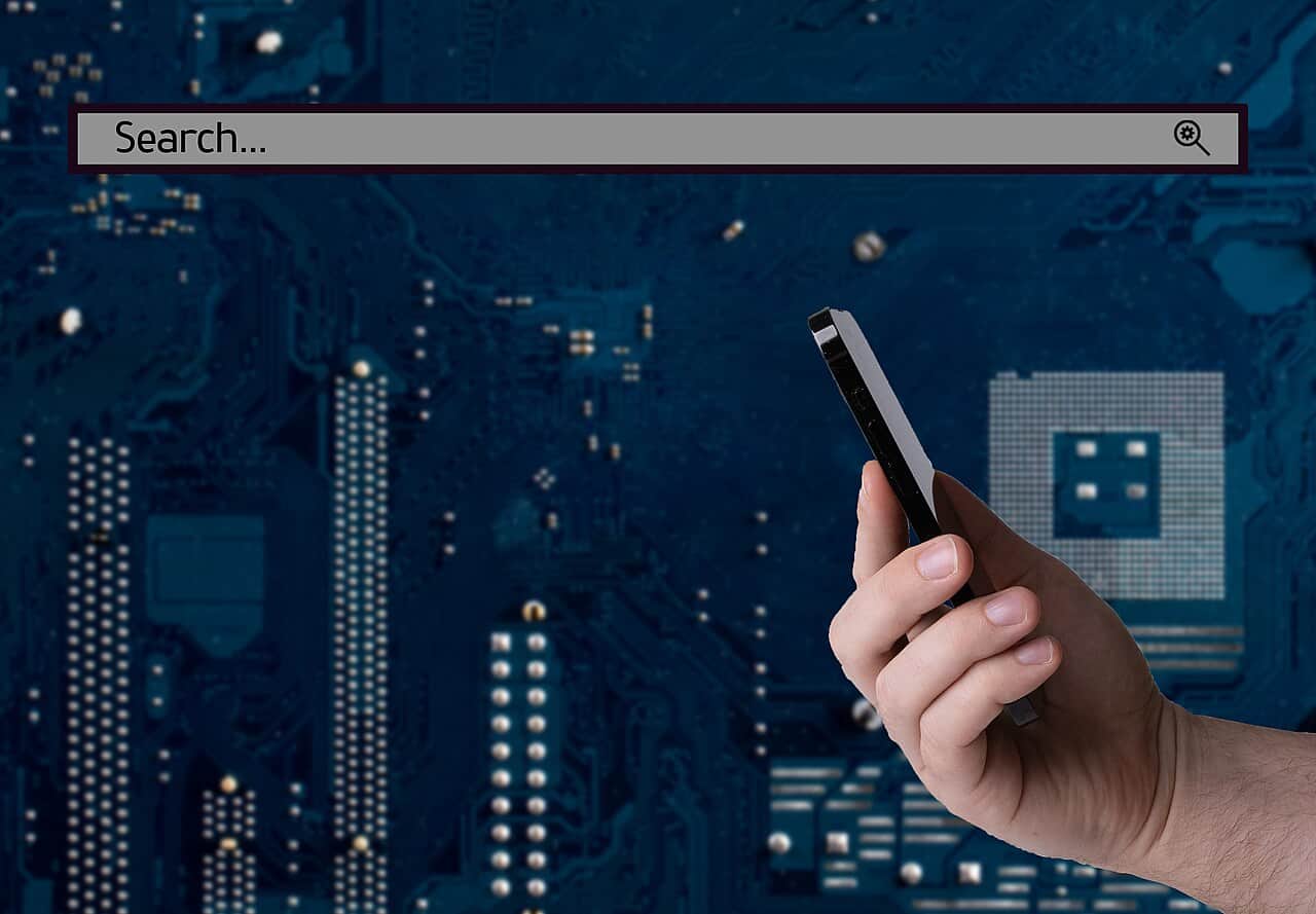 Enterprise AI ROI concept - hand holding smartphone with business and technology interface