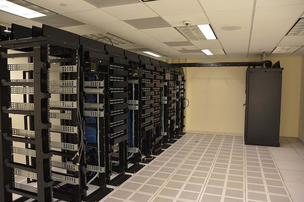 Rows of data center server racks powering enterprise AI workloads