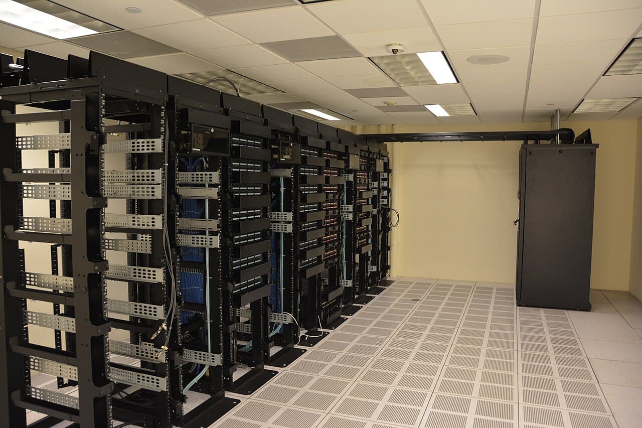 Rows of data center server racks powering enterprise AI workloads